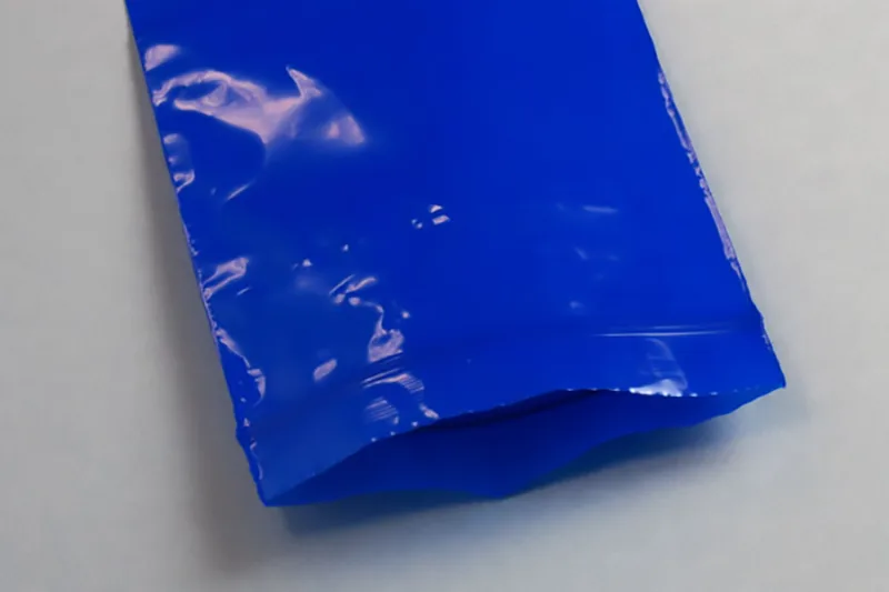 Opaque self-sealing bag