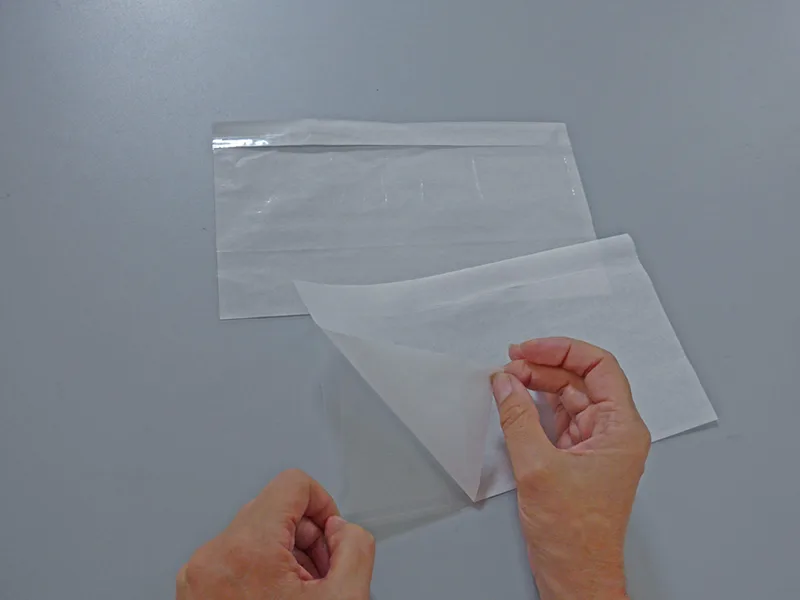 Adhesive envelopes "contains documentation" packing list